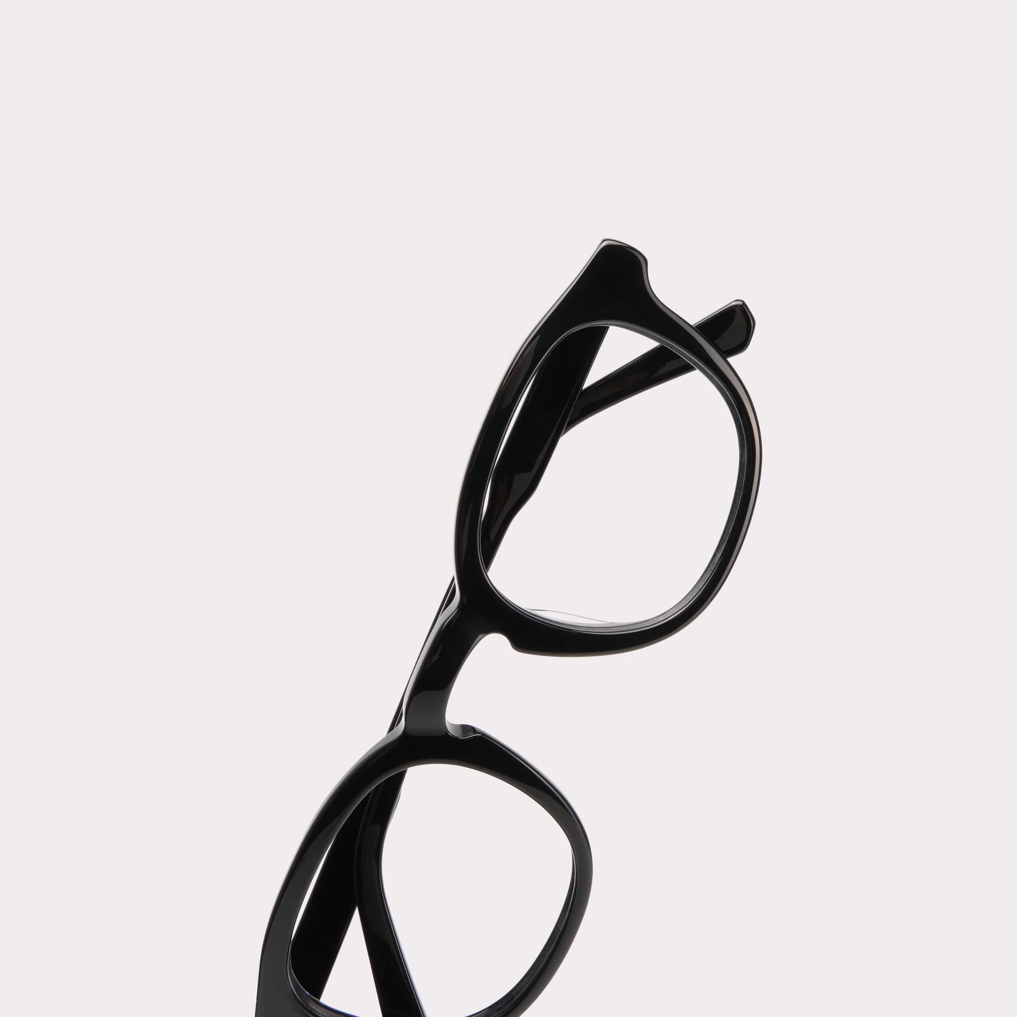 A pair of Loen Black Reading glasses in a macro view