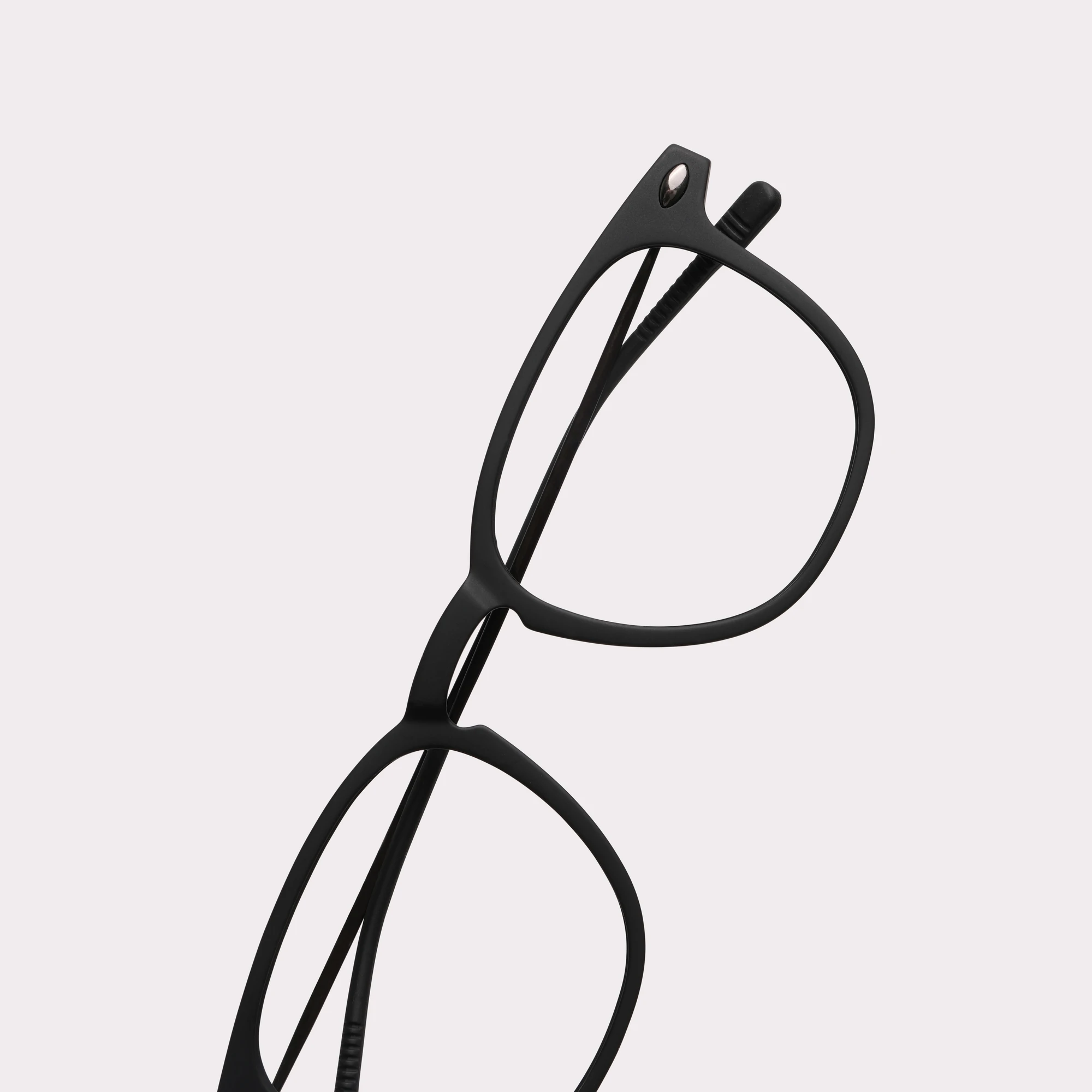 Une paire de Doni Noir Lunettes de lecture en vue macro