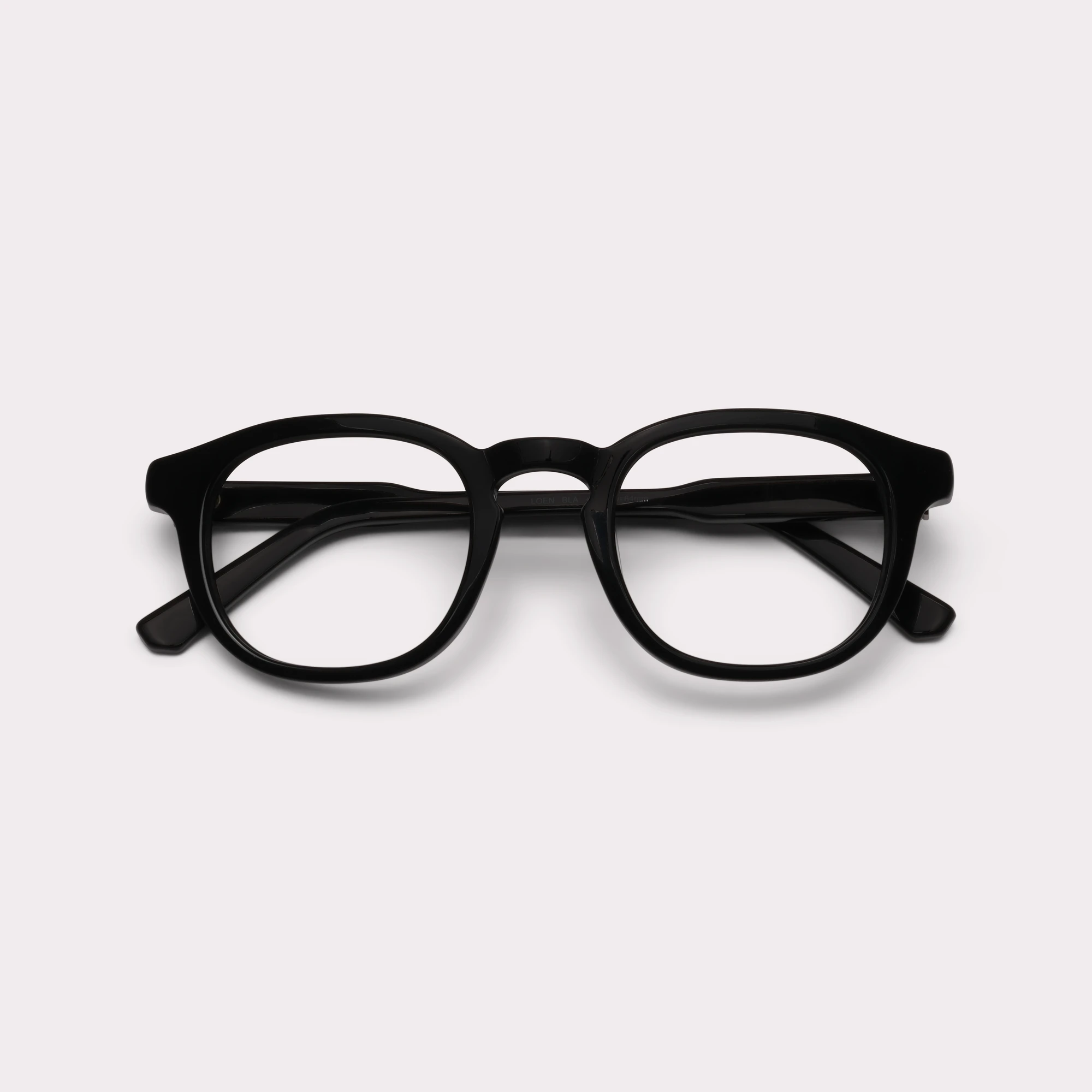 A pair of Loen Black Multi-distance™ blue light blocking reading glasses folded