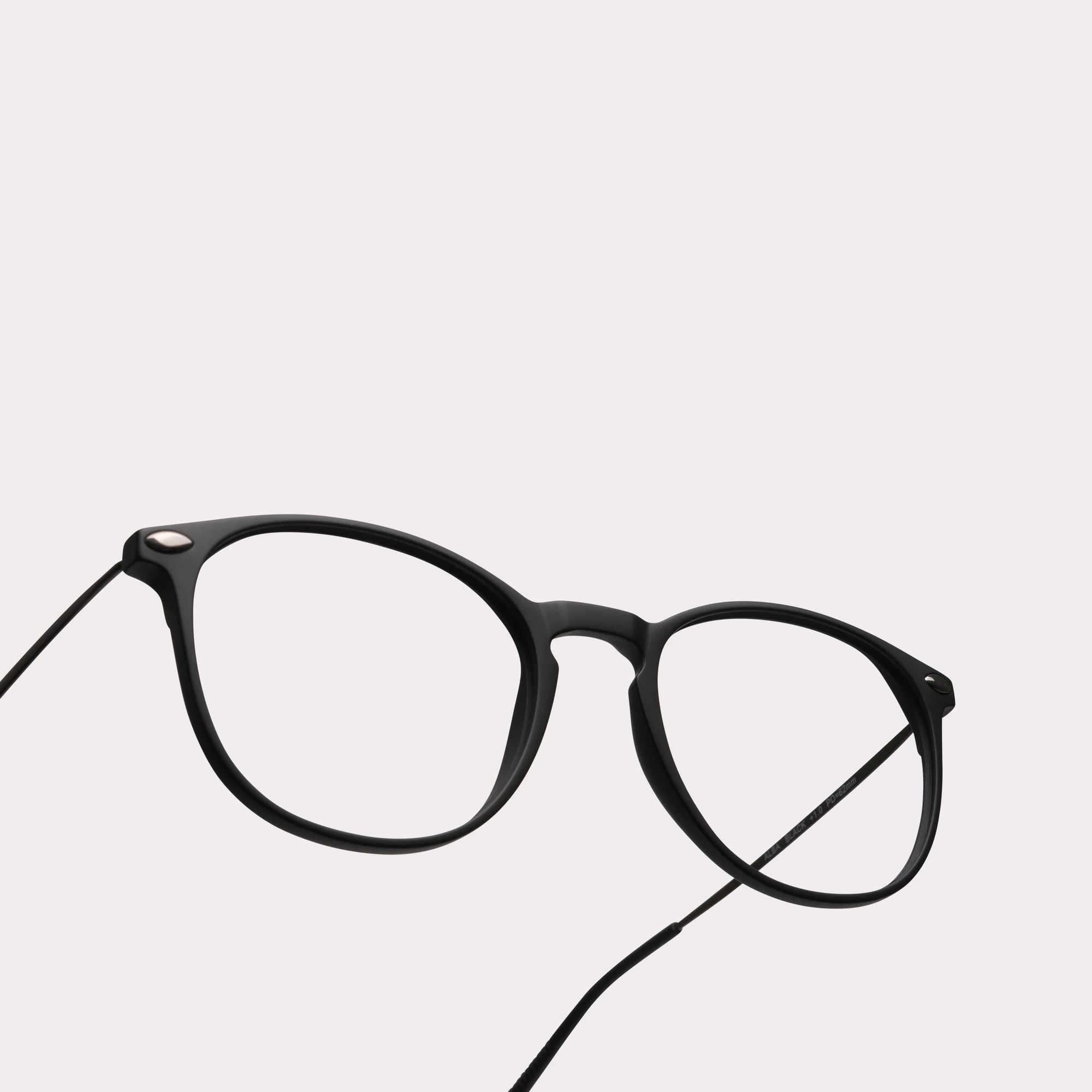 A pair of Alba Black Multi-distance™ reading glasses in a macro view