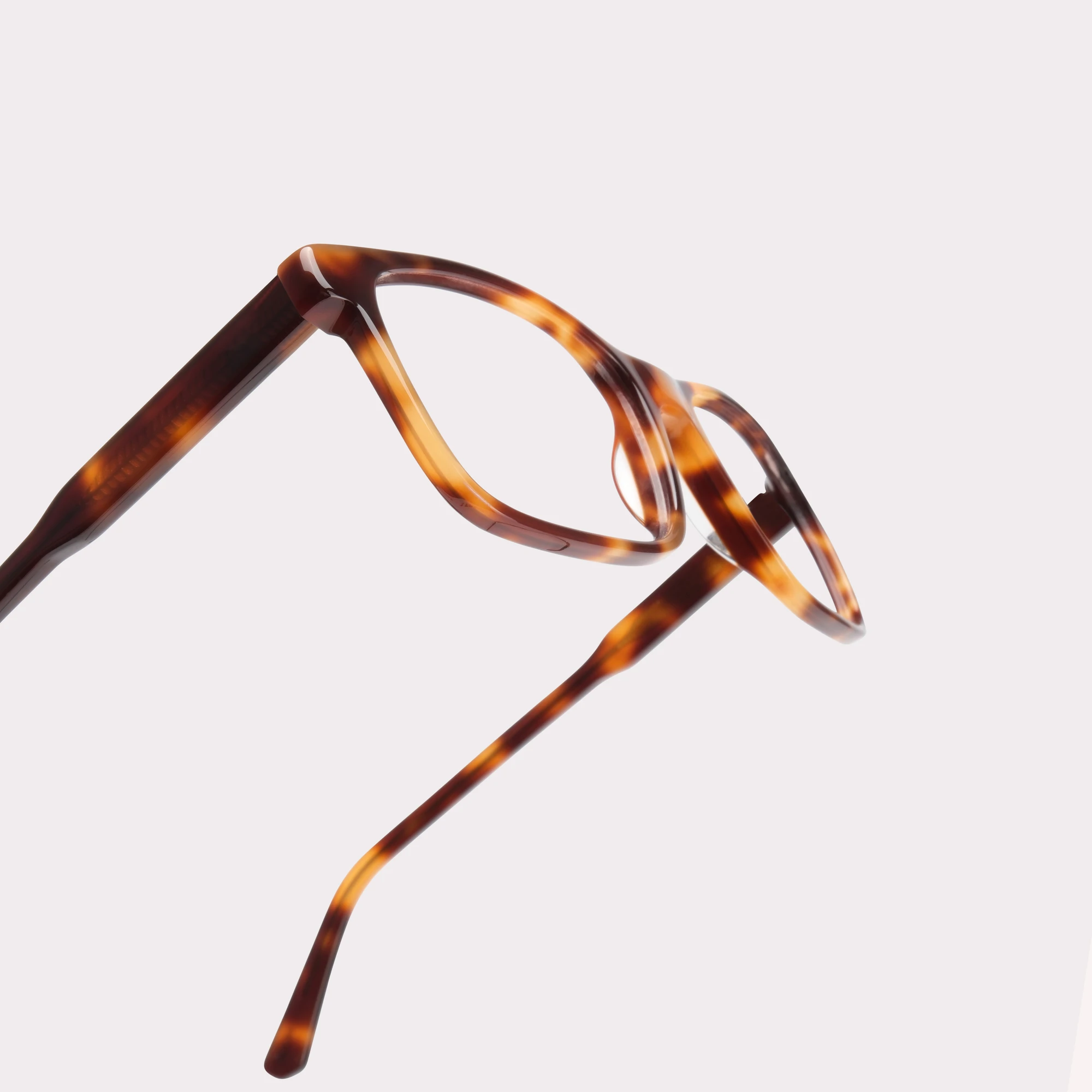 A pair of Justin Tortoise Reading glasses in a macro view