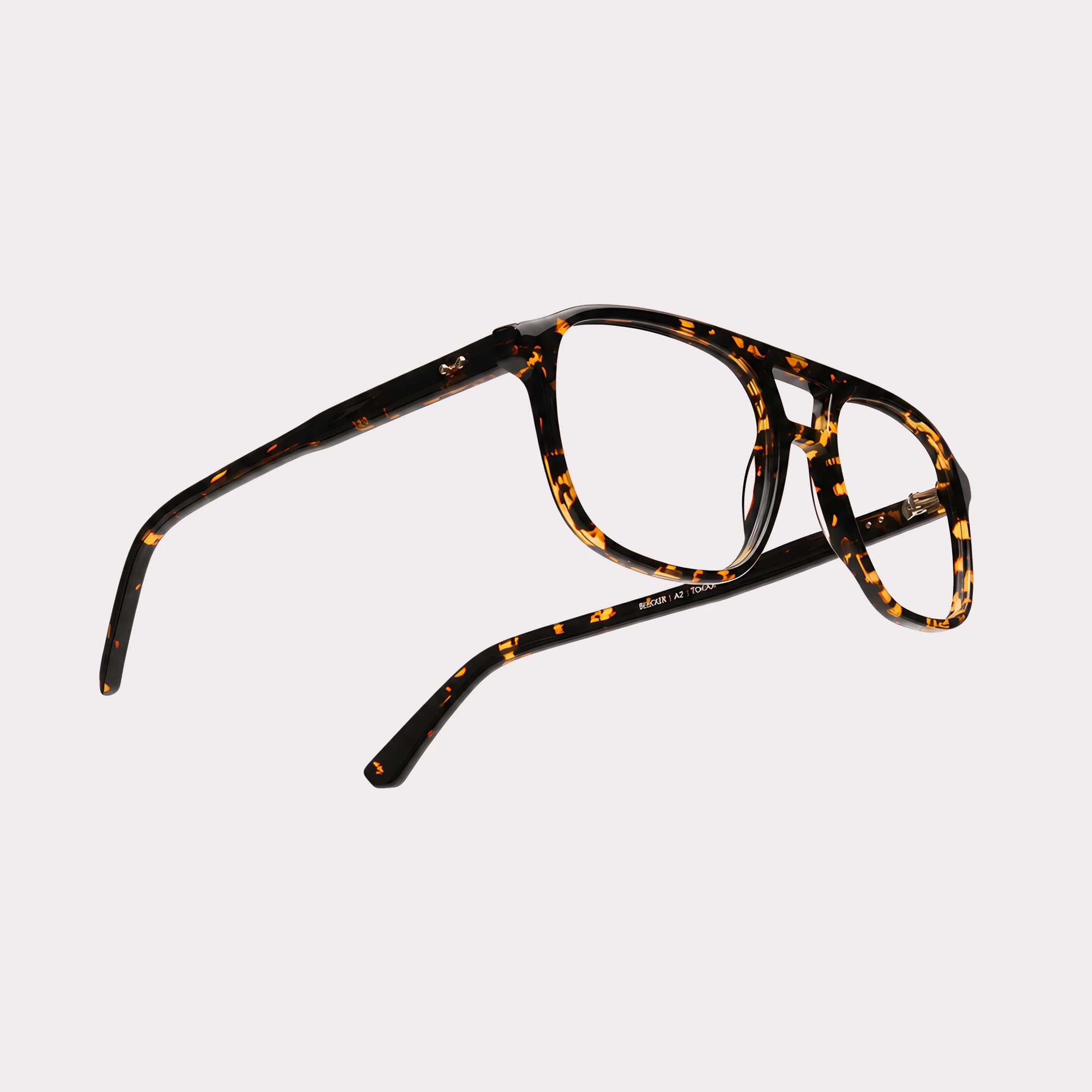 A pair of Milen Yellow tortoise Multi-distance™ blue light blocking reading glasses in a macro view