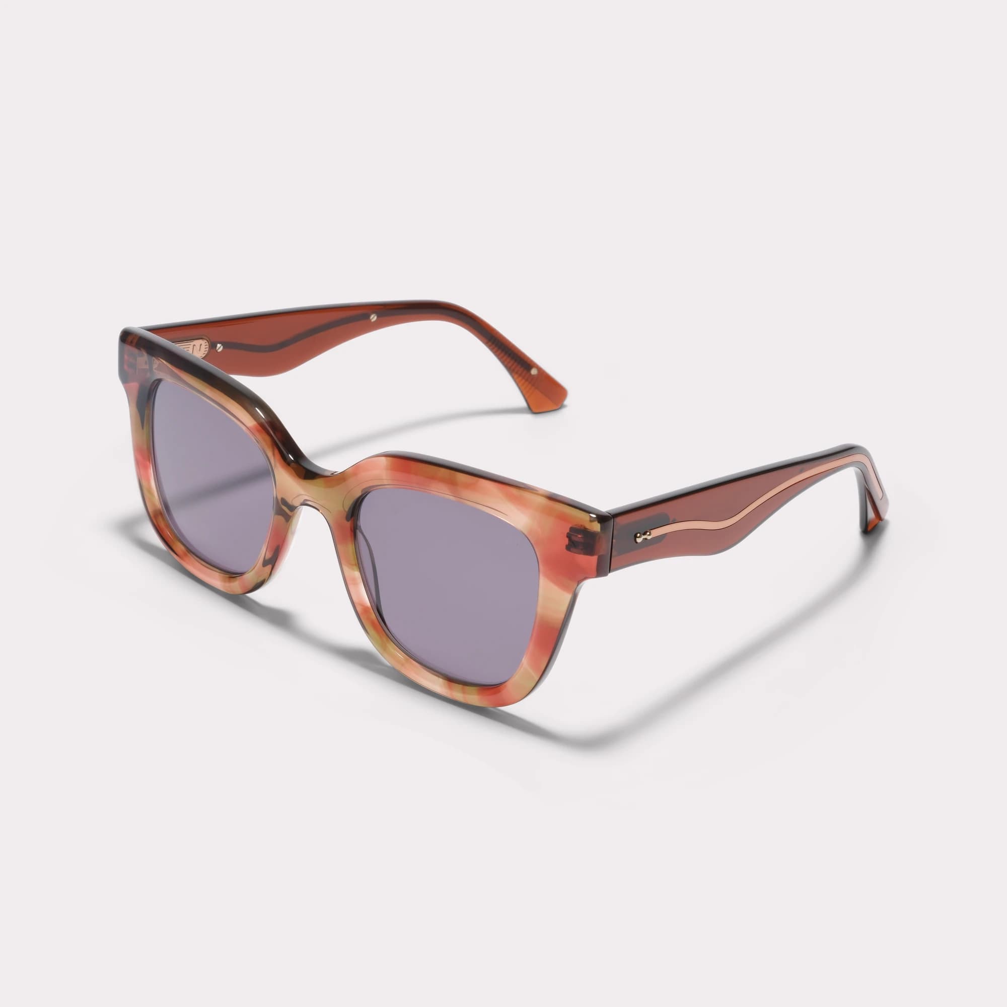 A pair of Gaby Blossom Sunglasses seen from the side