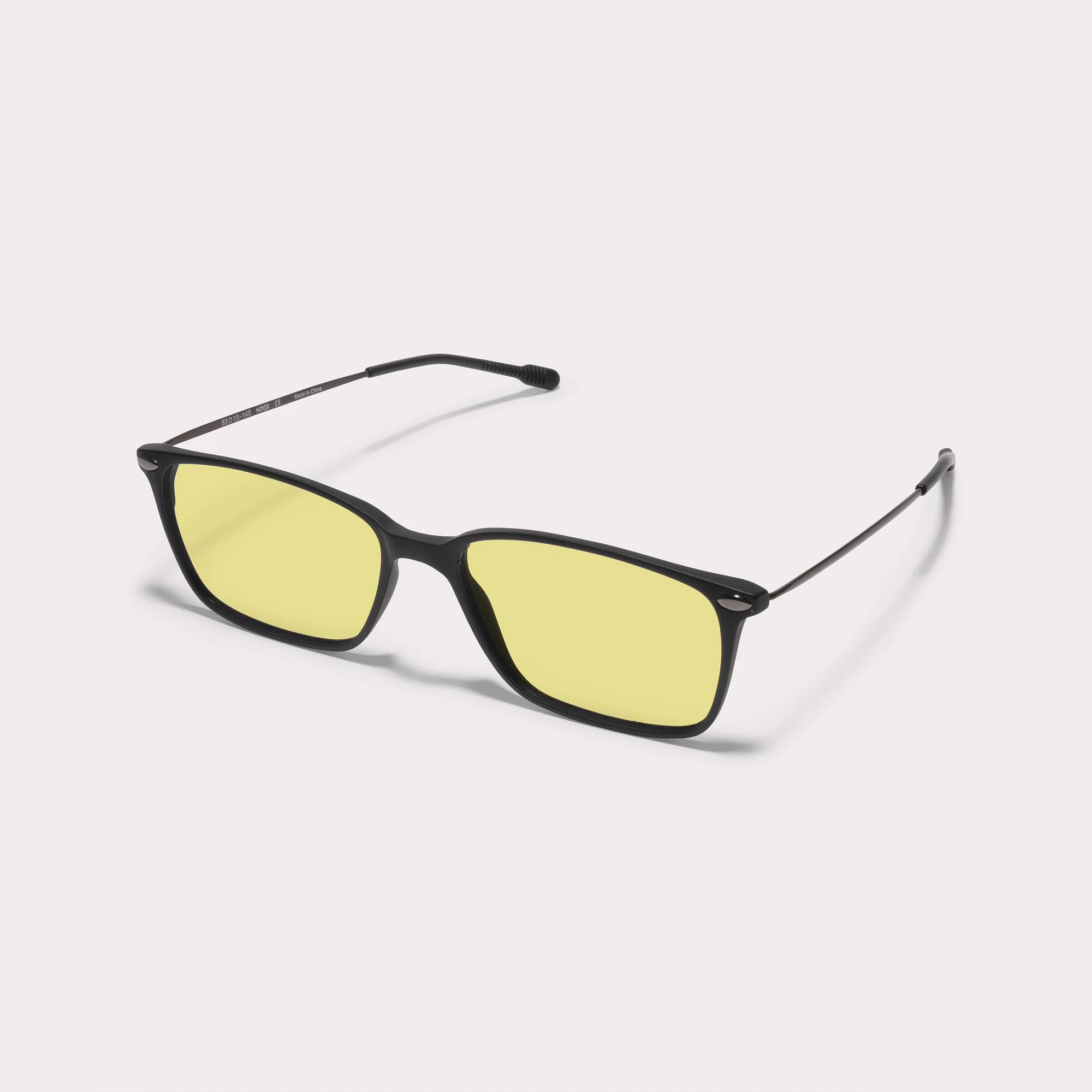 A pair of Bao Black Driving Glasses seen from the side
