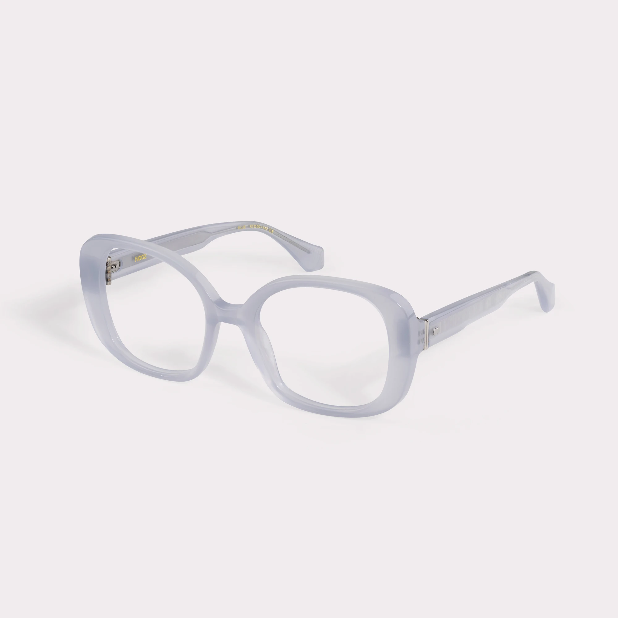 A pair of Joy Blue Reading glasses seen from the side