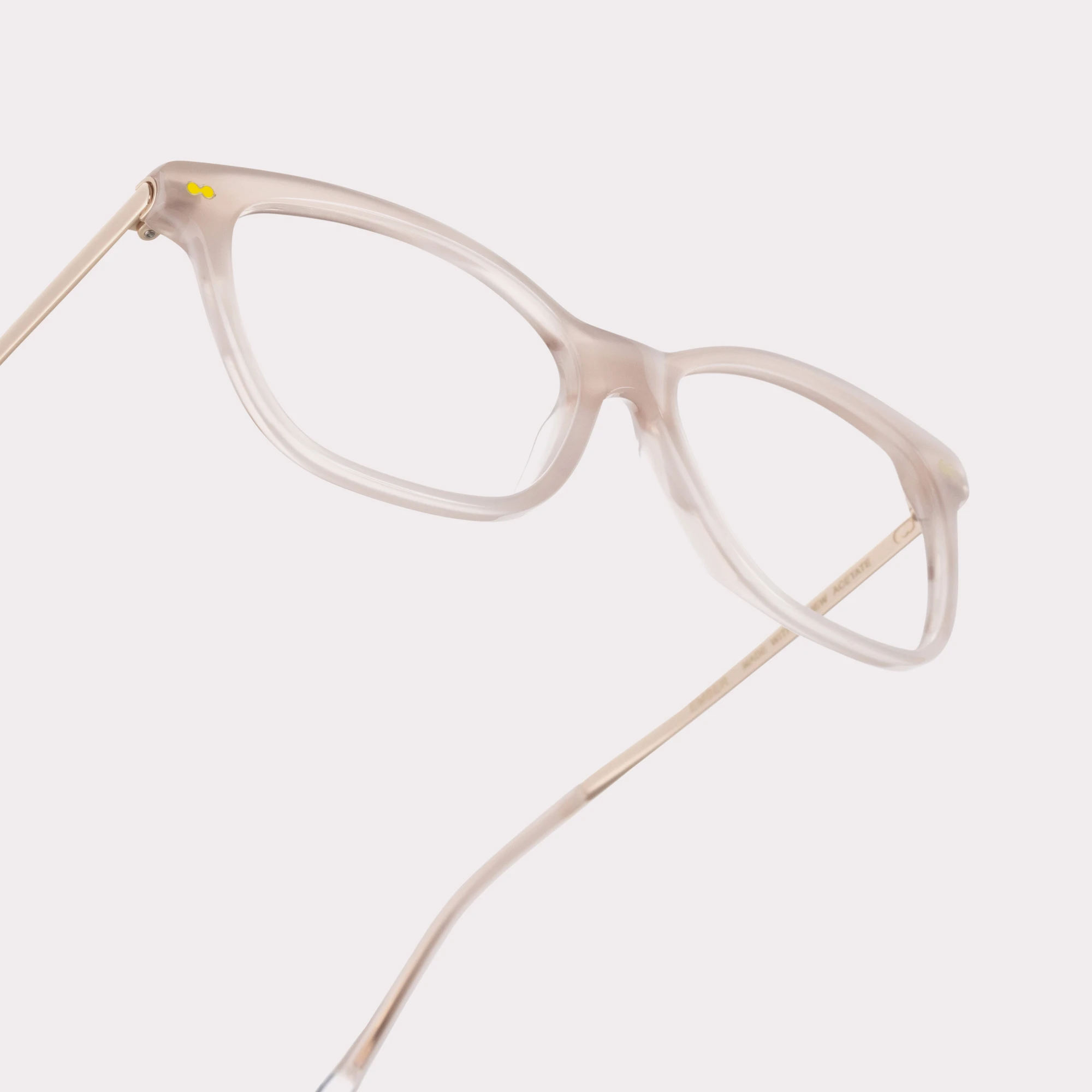 A pair of Ember Pink Reading glasses in a macro view