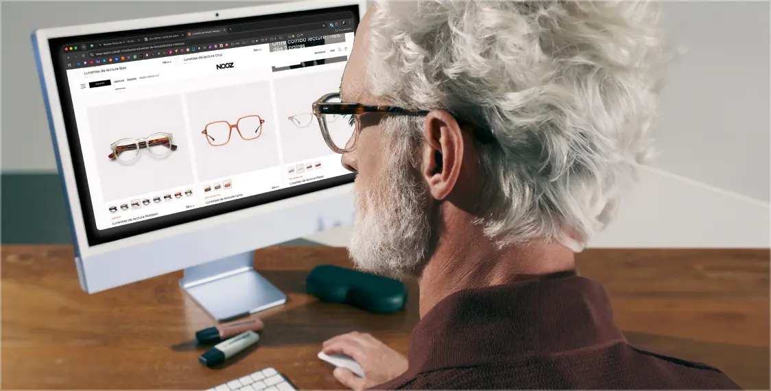 Woman working on her laptop with her Multi-Distance glasses, natural light