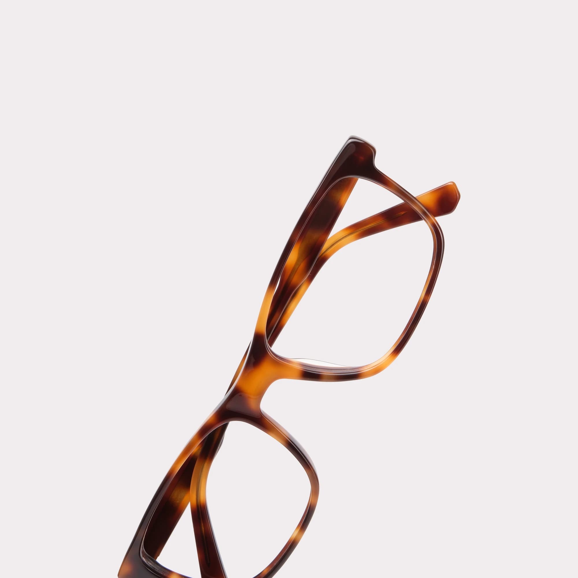 A pair of Justin Tortoise Multi-distance™ blue light blocking reading glasses in a macro view