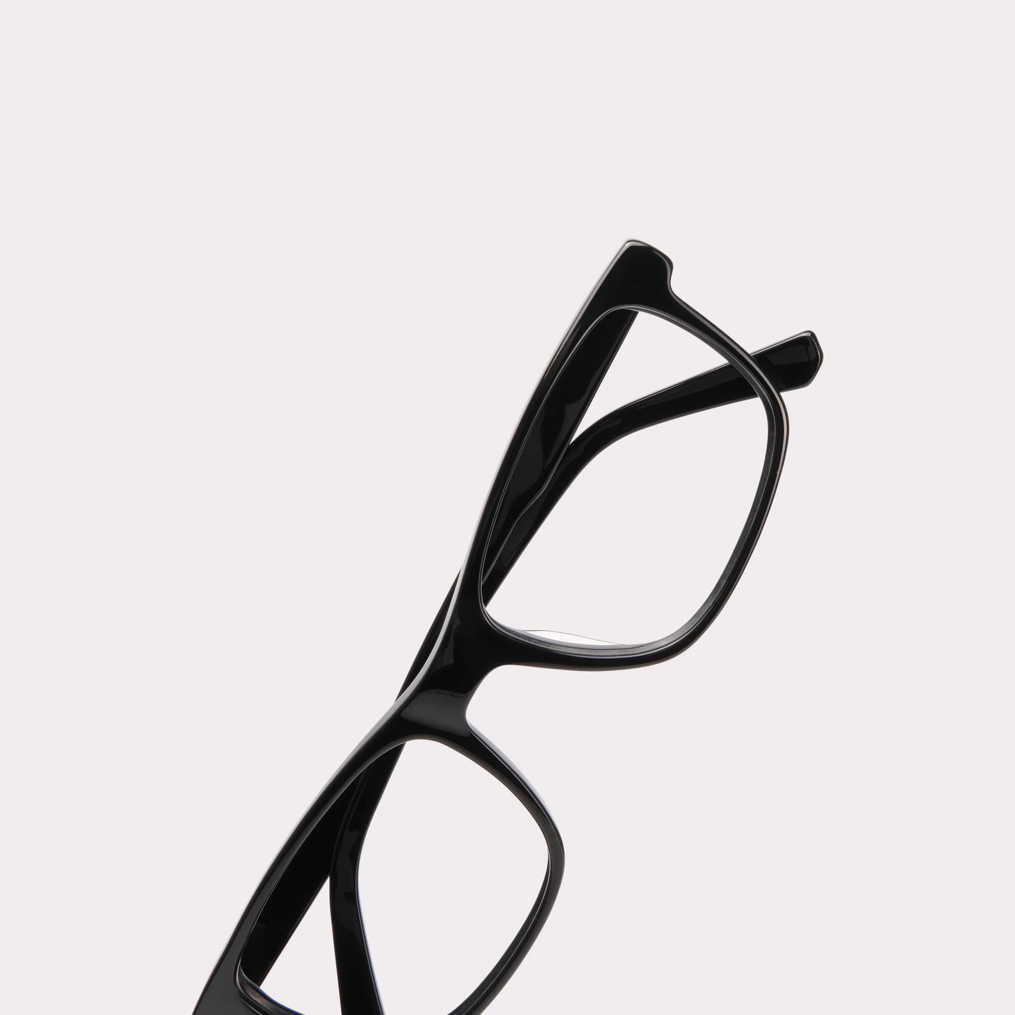 Une paire de Justin Noir Lunettes de lecture en vue macro