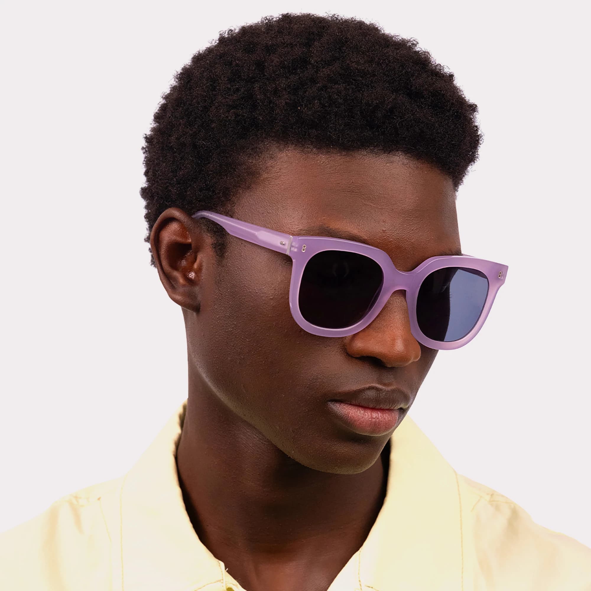 A pair of Sky Mauve Sunglasses