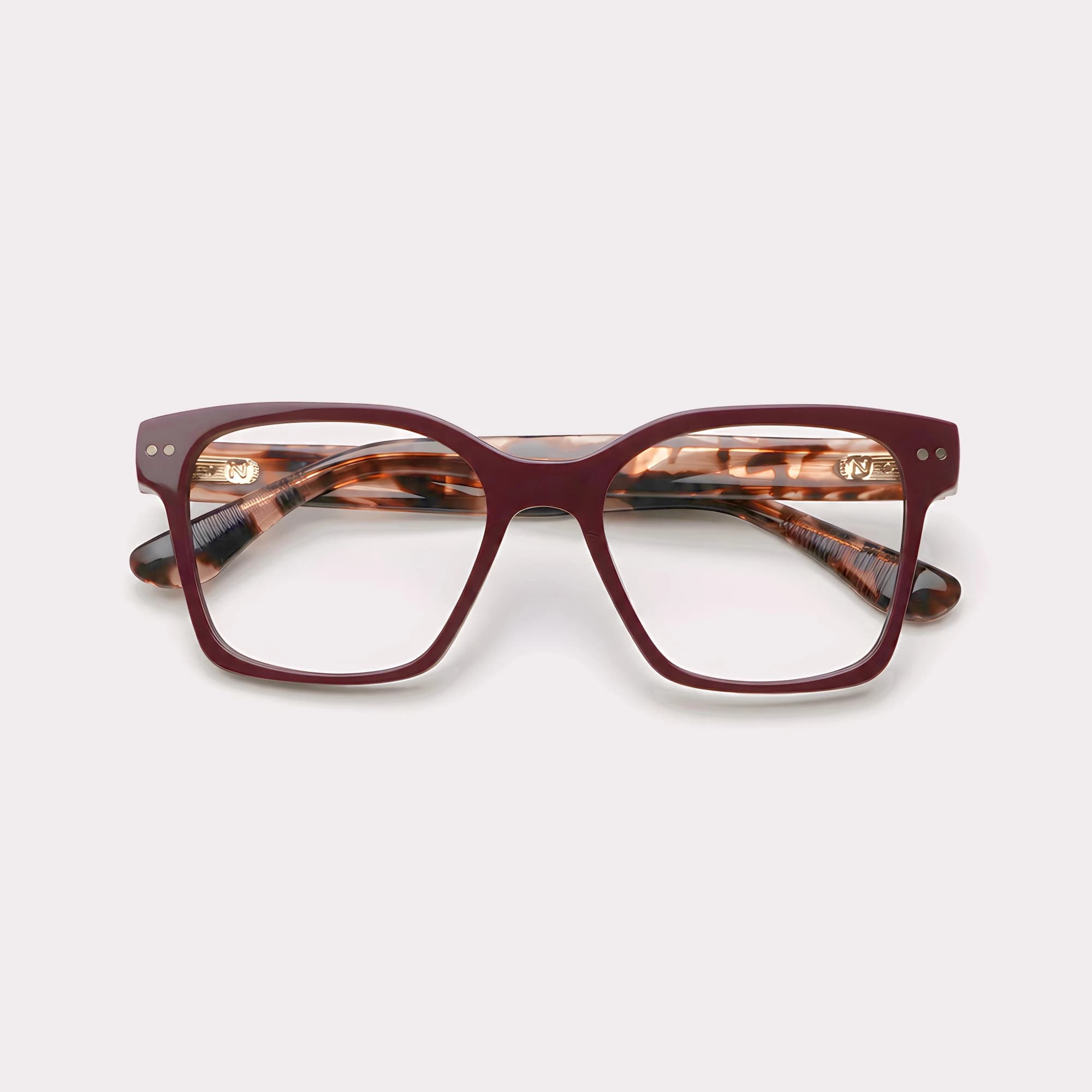 Un par de Lea Burgundy Tortoise Gafas graduadas plegado