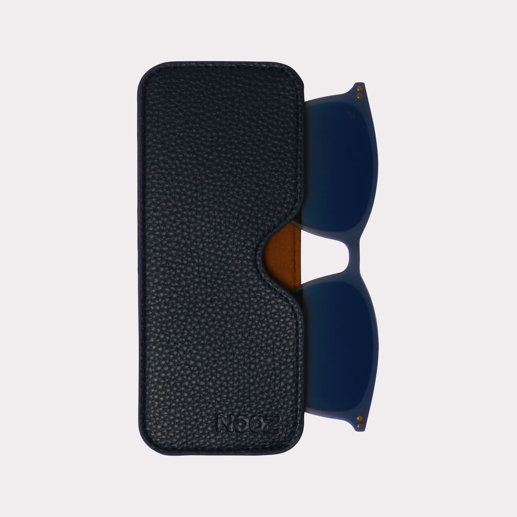 A pair of Max Gradient blue Clip coming out of its case