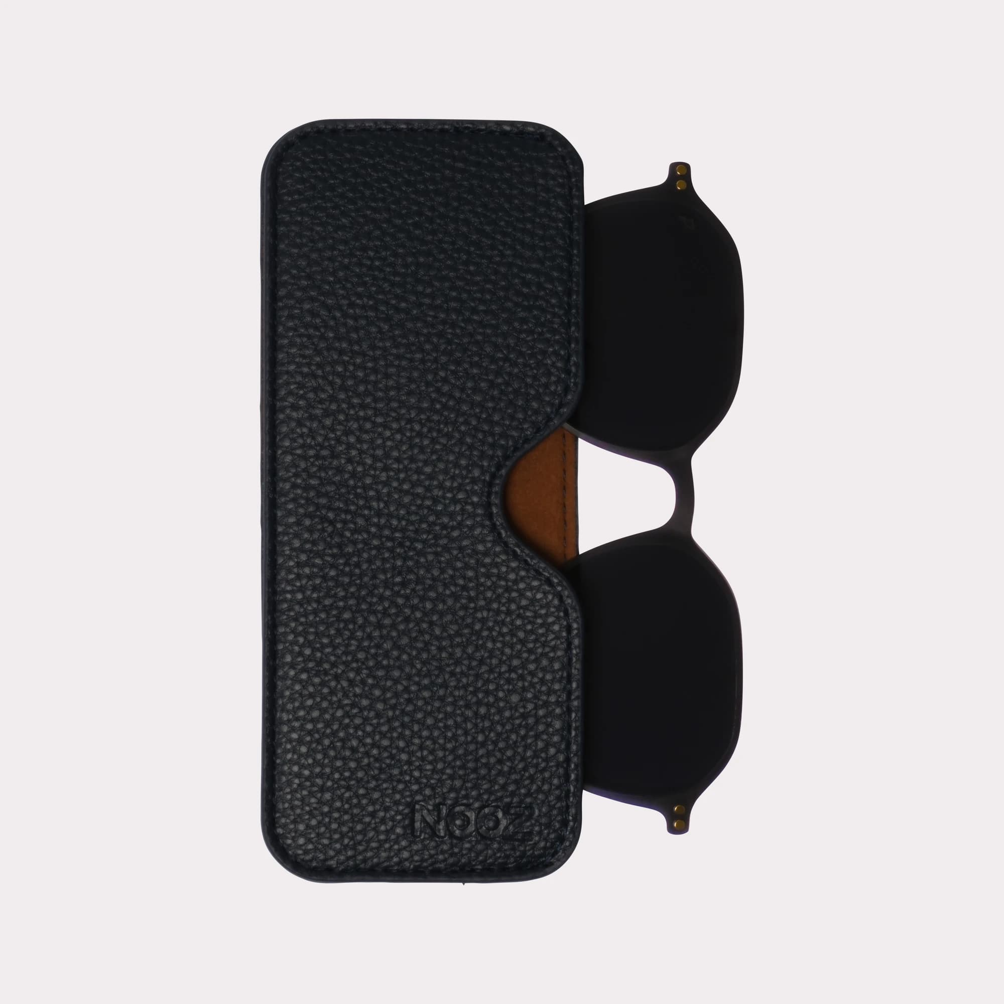 A pair of Nova Grey Clip coming out of its case