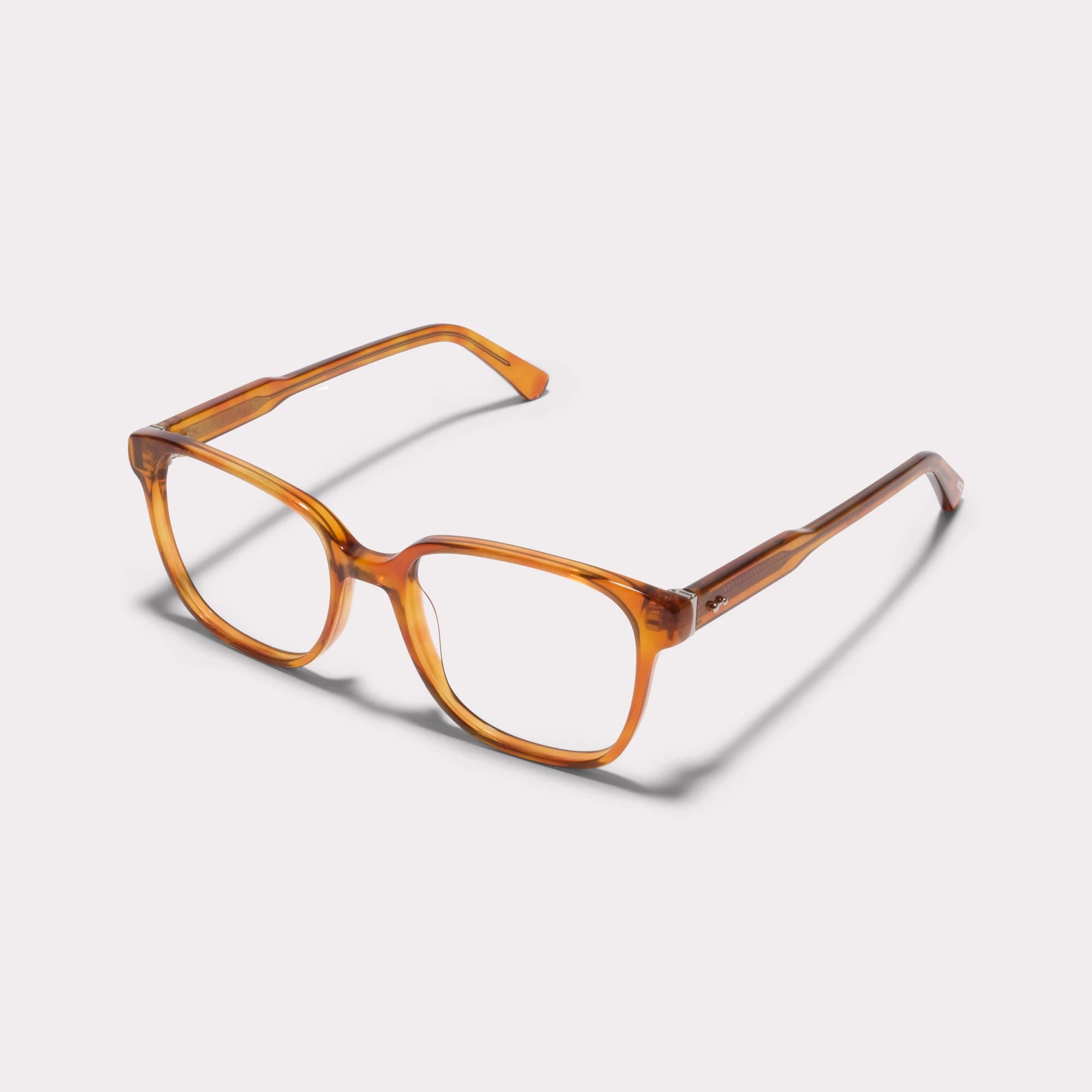 A pair of Clara Light tortoise Reading glasses seen from the side
