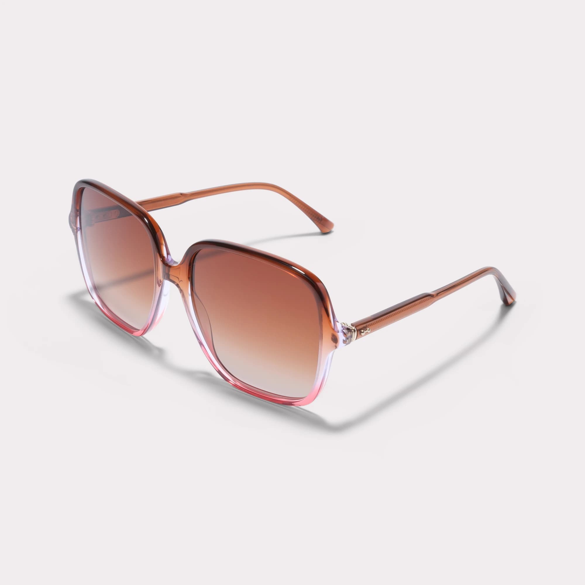 Un par de Jenny Gradient Pink Gafas de sol vista de lado