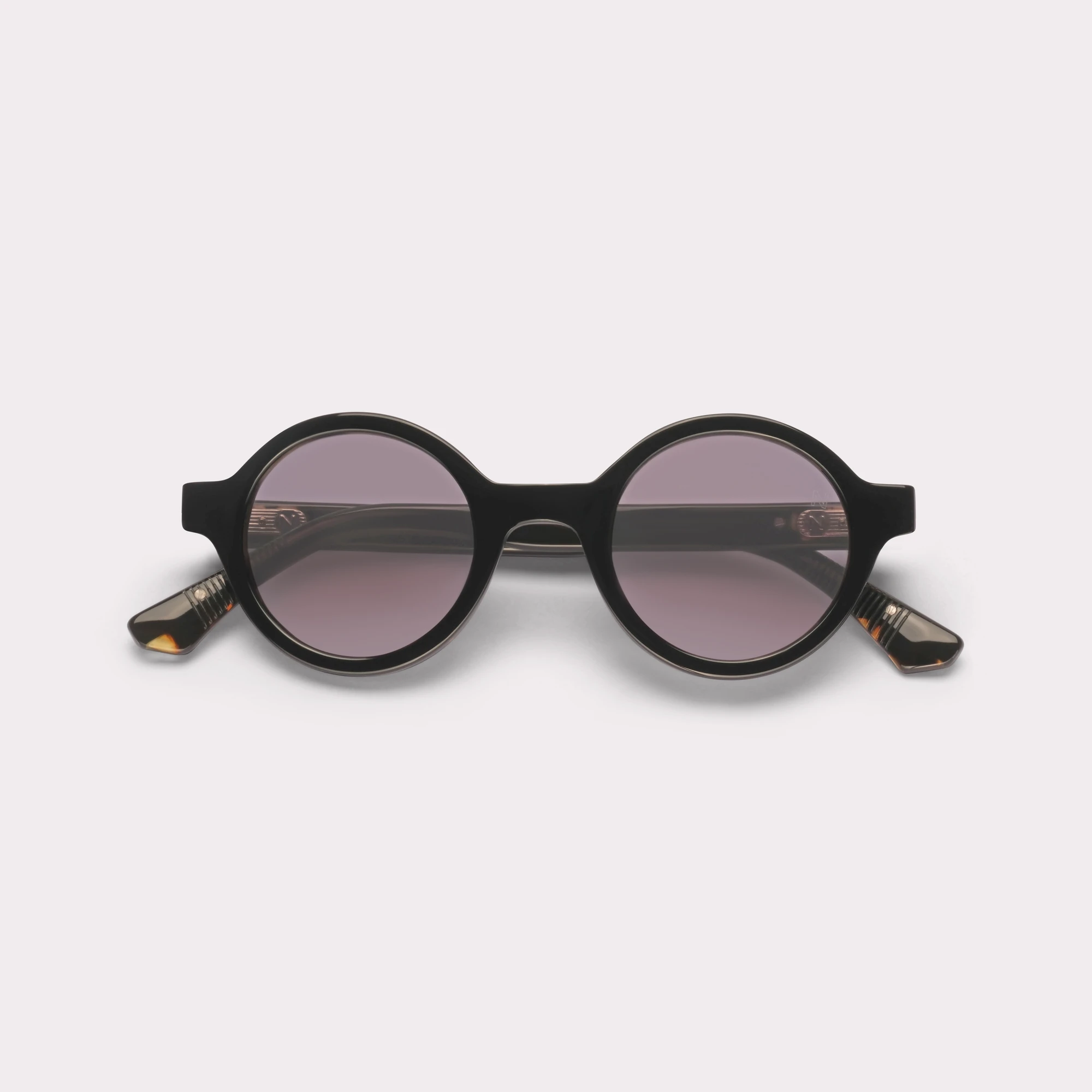 A pair of Nelson Black Sunglasses folded