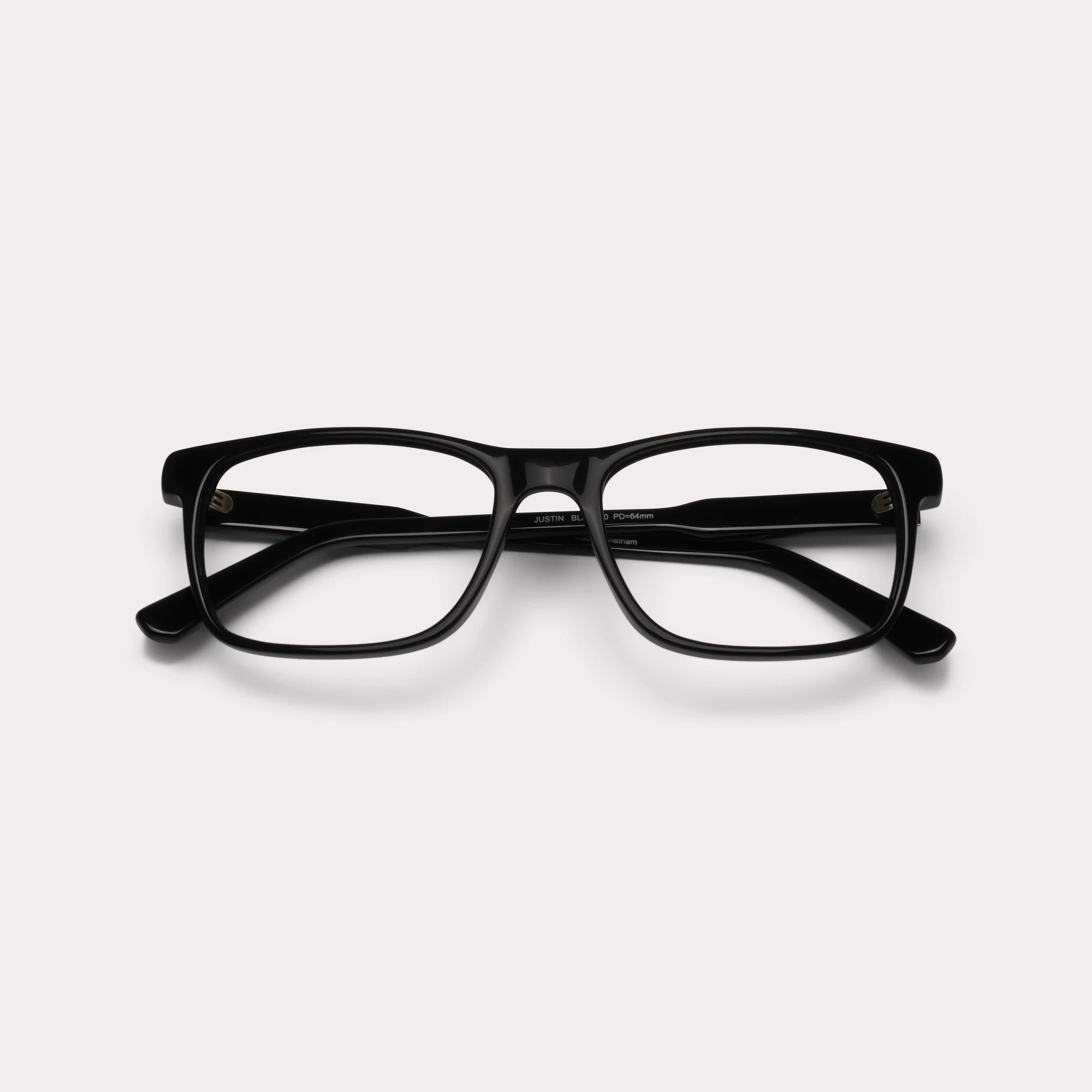 A pair of Justin Black Multi-distance™ blue light blocking reading glasses folded