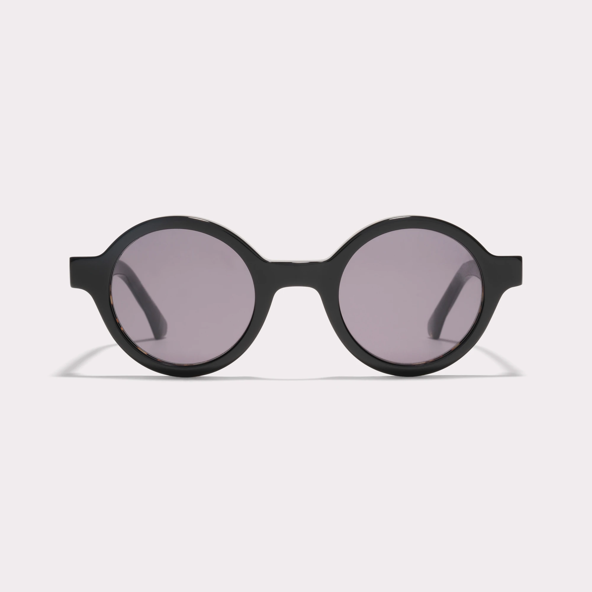 A pair of Nelson Black Sunglasses seen from the front