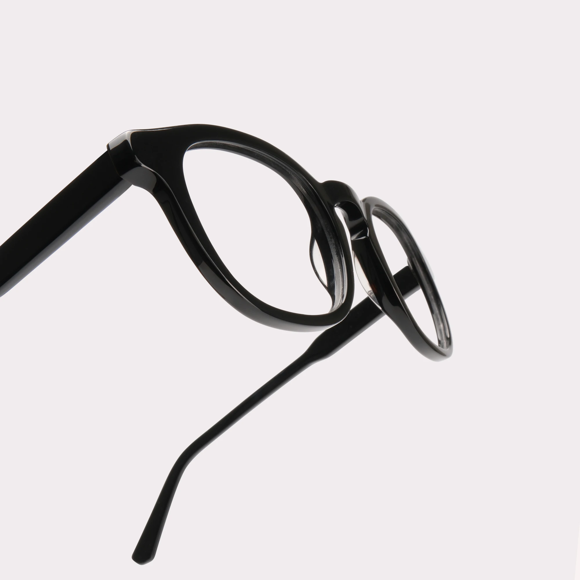 A pair of Loen Black Multi-distance™ blue light blocking reading glasses in a macro view