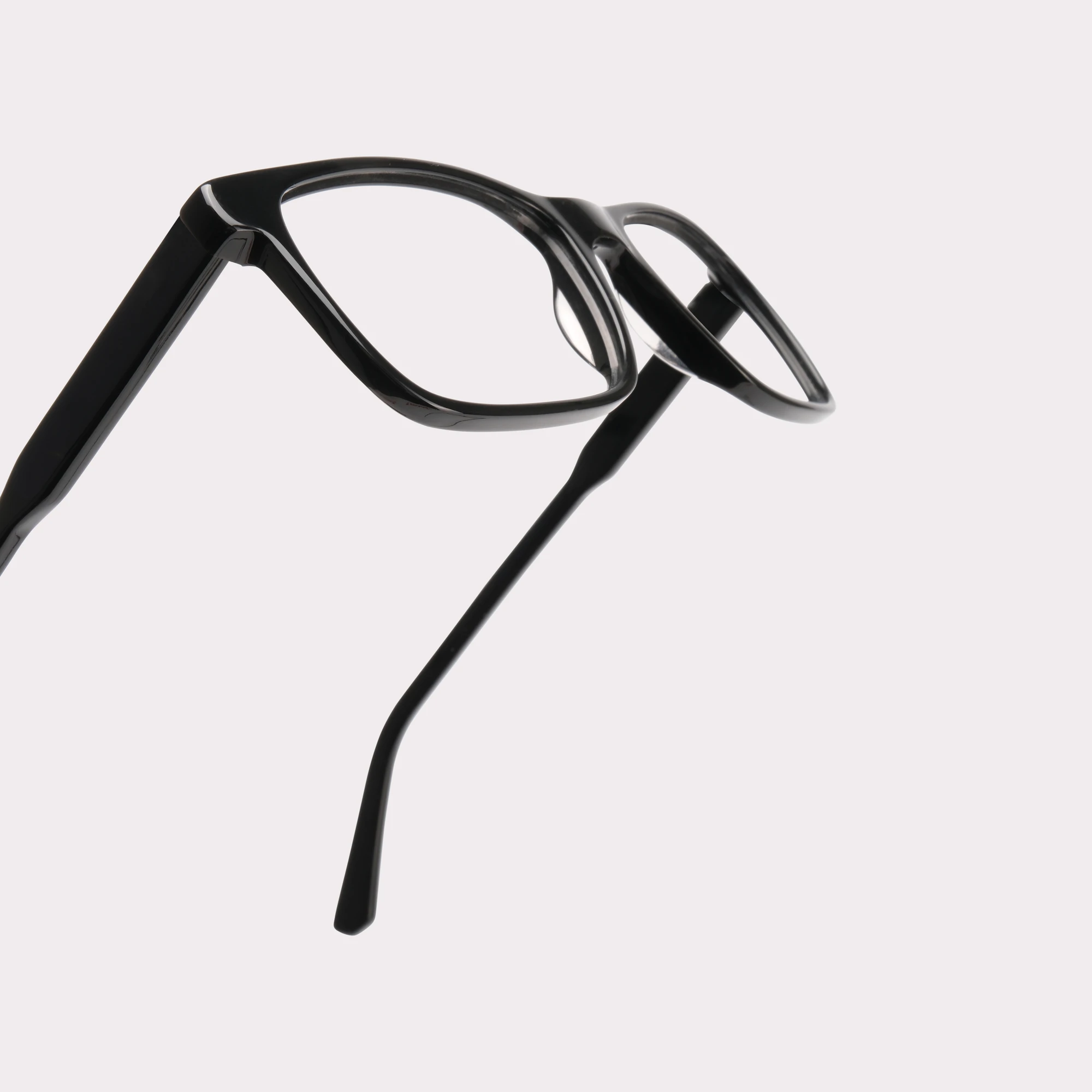 A pair of Justin Black Multi-distance™ blue light blocking reading glasses in a macro view