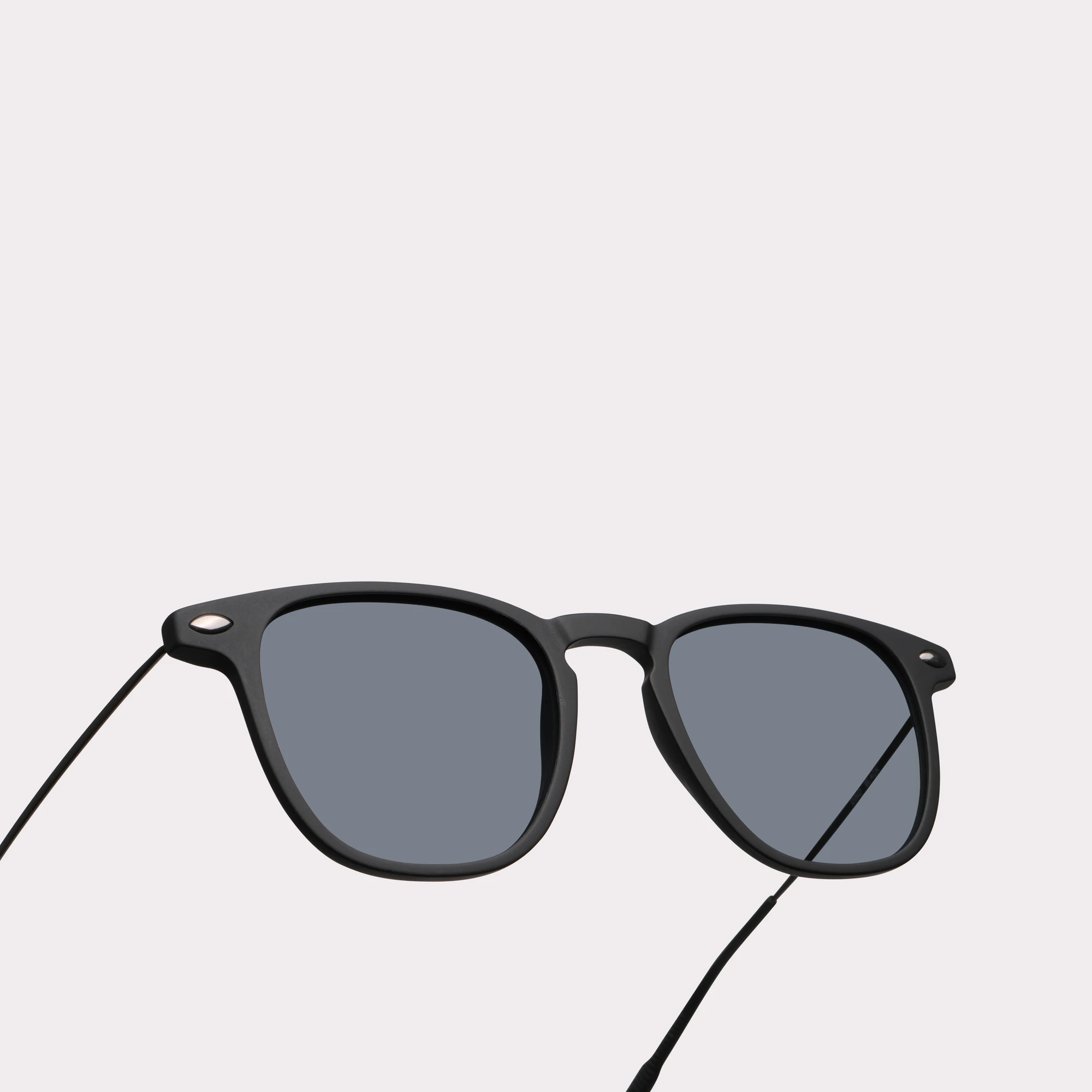 A pair of Doni Black Multi-distance™ reading sunglasses in a macro view