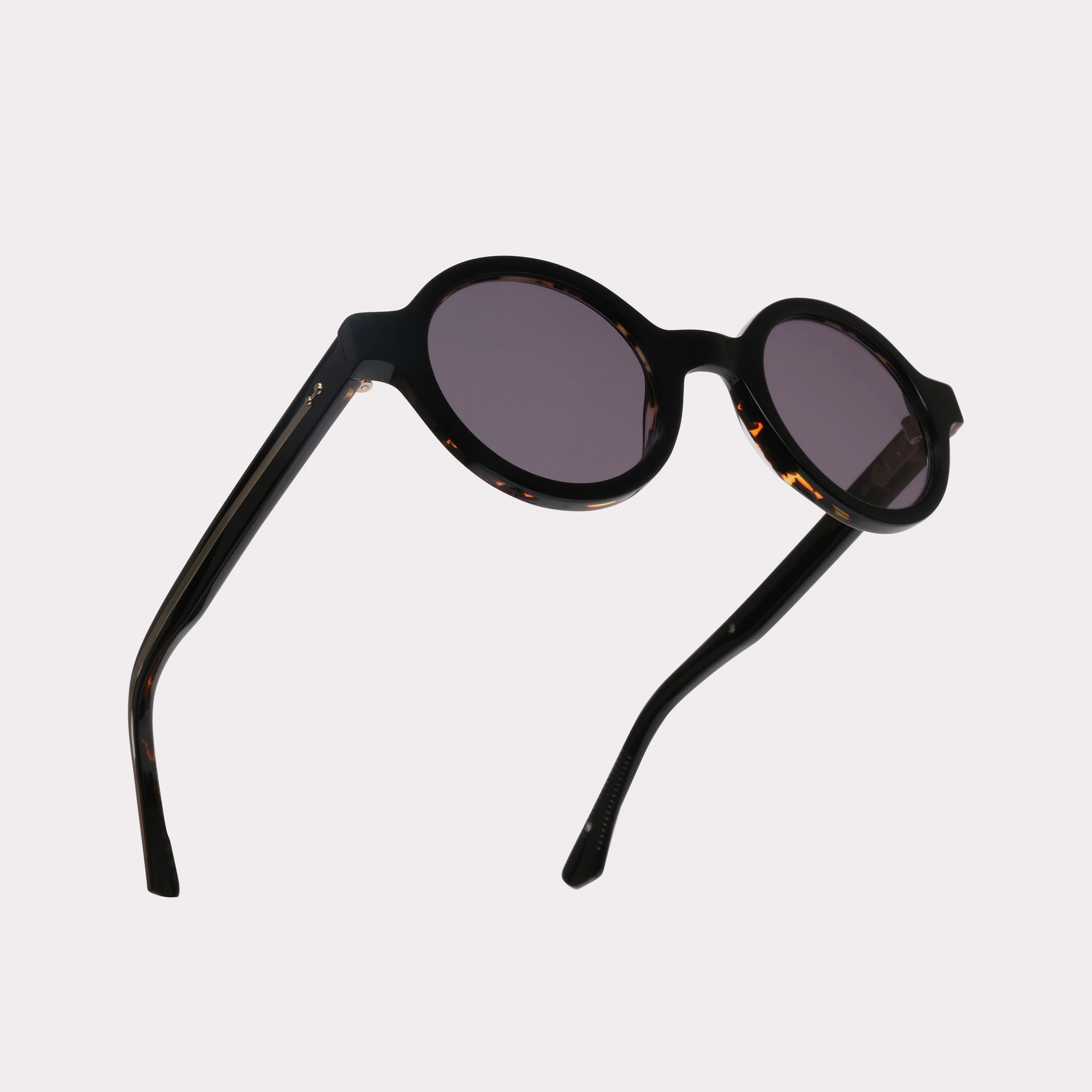 A pair of Nelson Black Sunglasses in a macro view