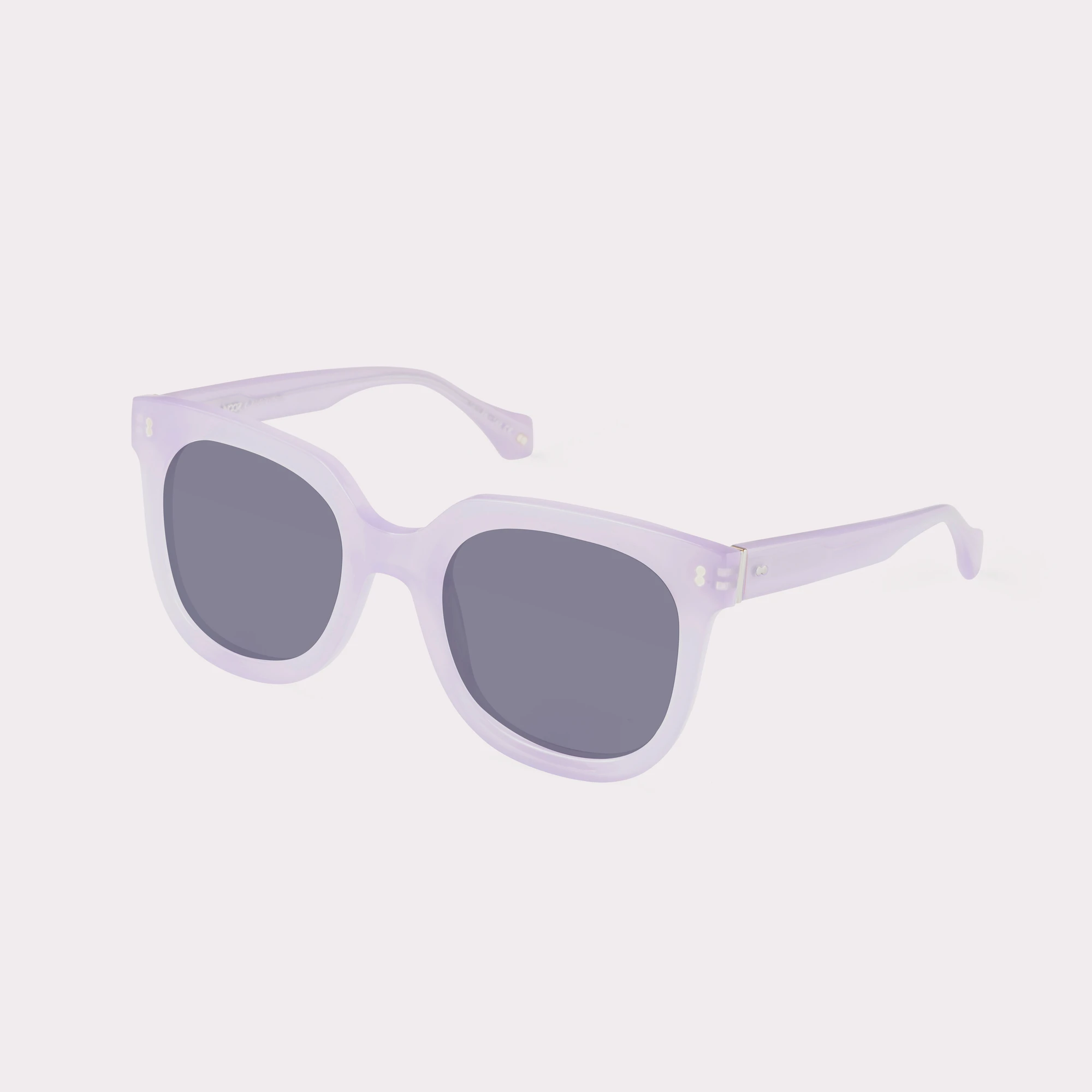 A pair of Sky Mauve Sunglasses seen from the side