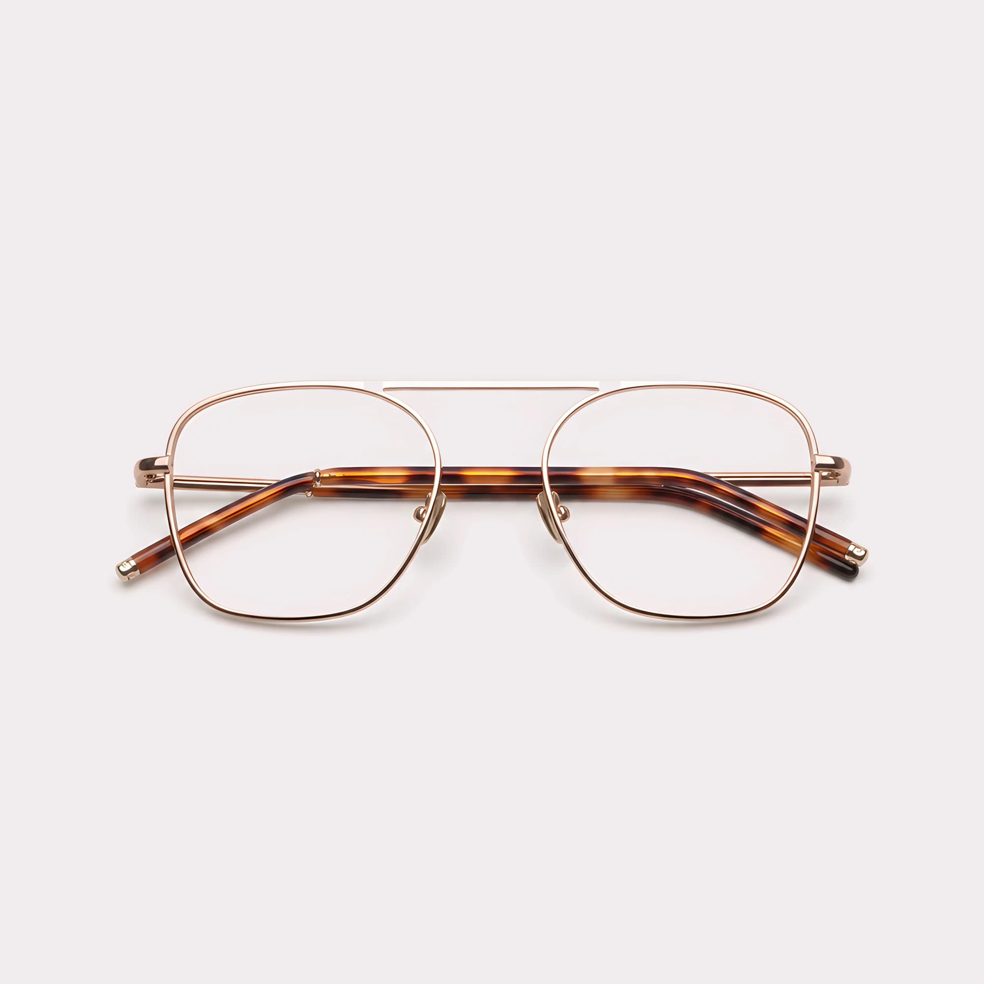 Un par de Bowie Rose Gold Gafas graduadas plegado
