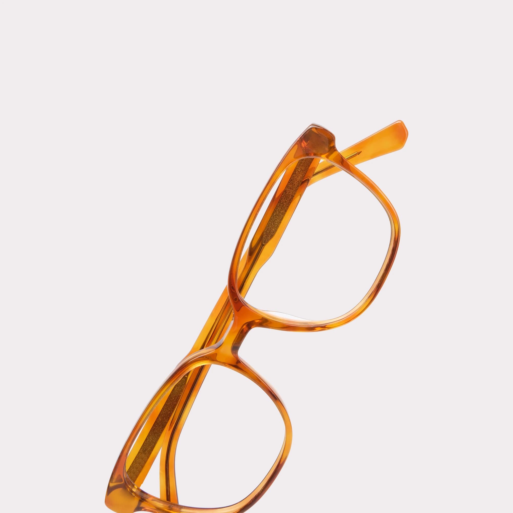 A pair of Clara Light tortoise Multi-distance™ blue light blocking reading glasses in a macro view