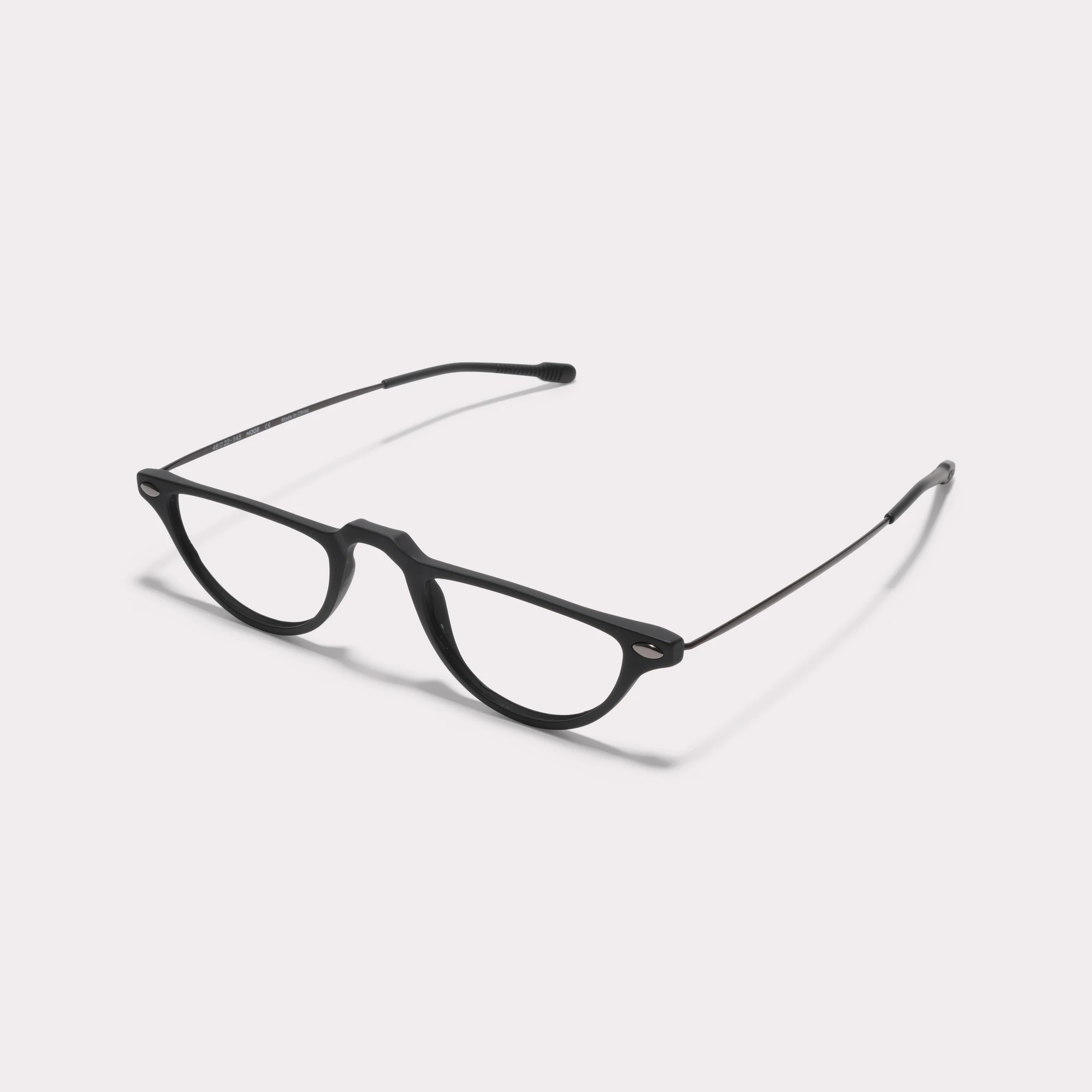 A pair of Moon Black Reading glasses seen from the side
