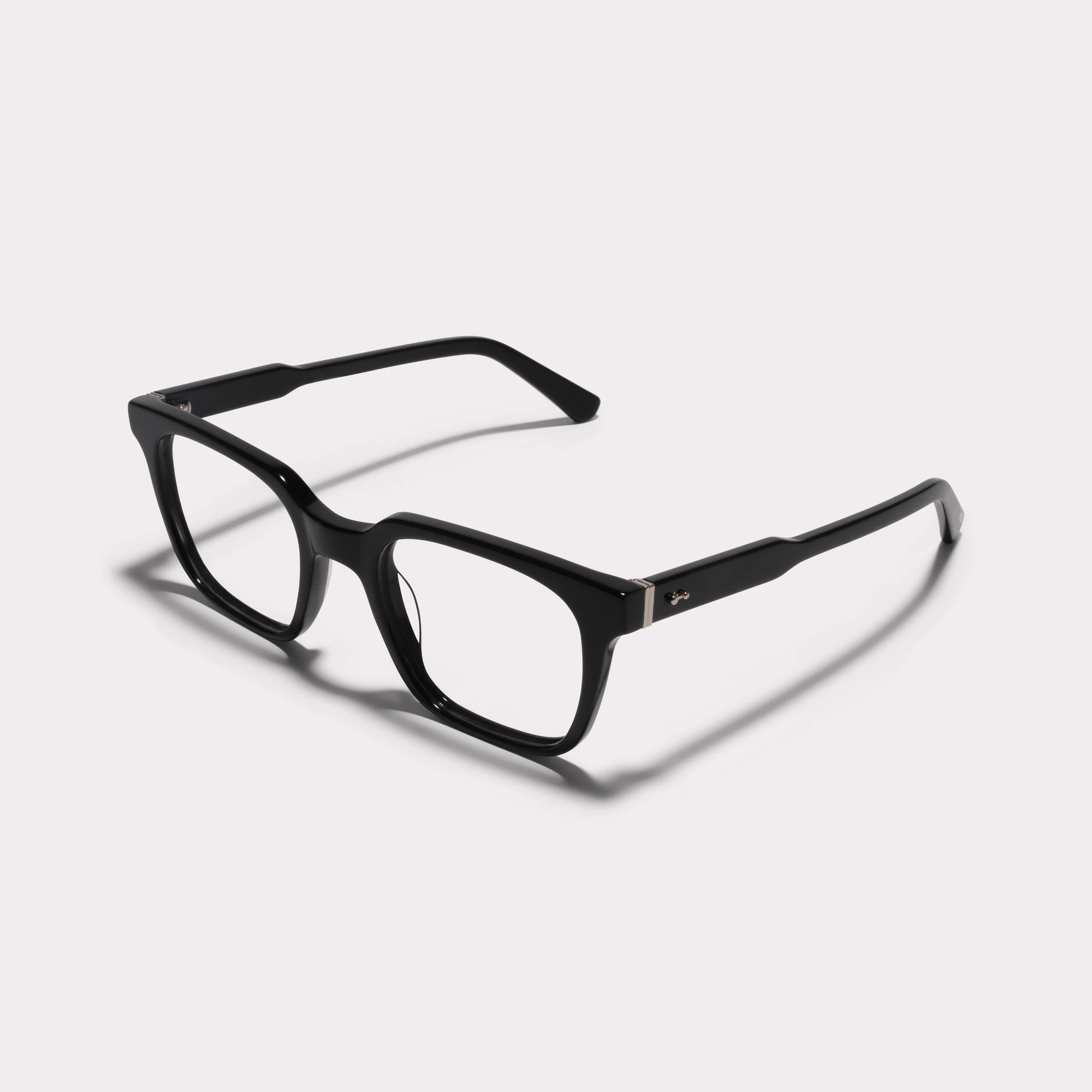 A pair of Venn Black Reading glasses seen from the side