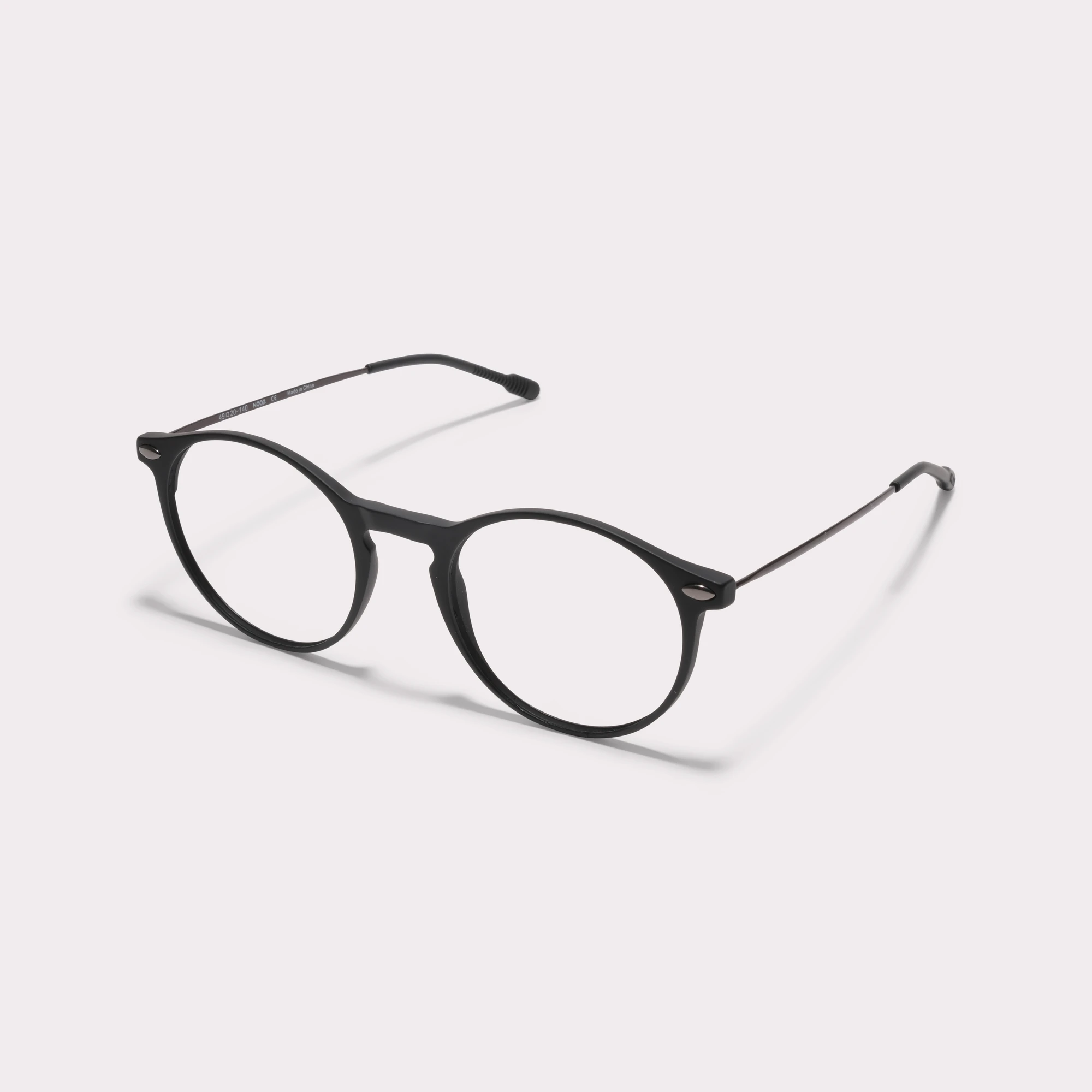 A pair of Cruz Black Reading glasses seen from the side
